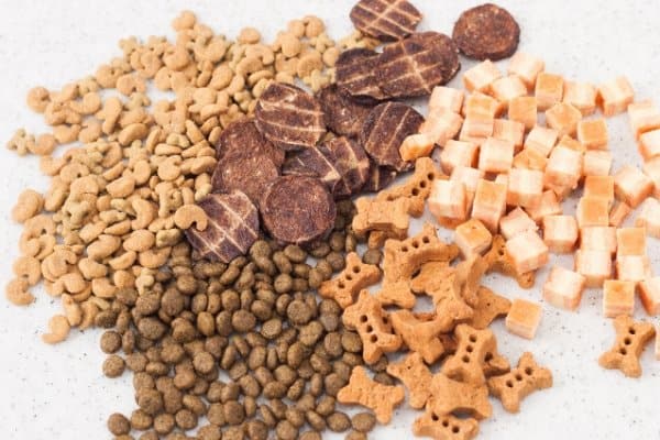 Five varieties of commercial dog food.